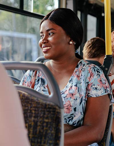 Young black woman in public transport