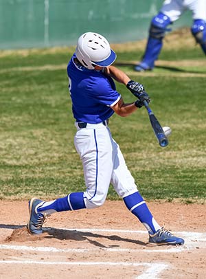 Action photo of high school baseball players