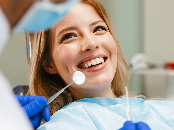 smiling woman at dental checkup