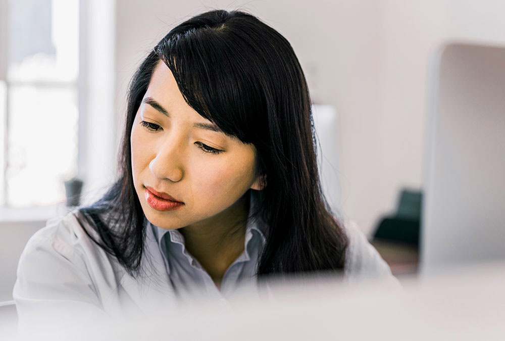 a woman looking up information