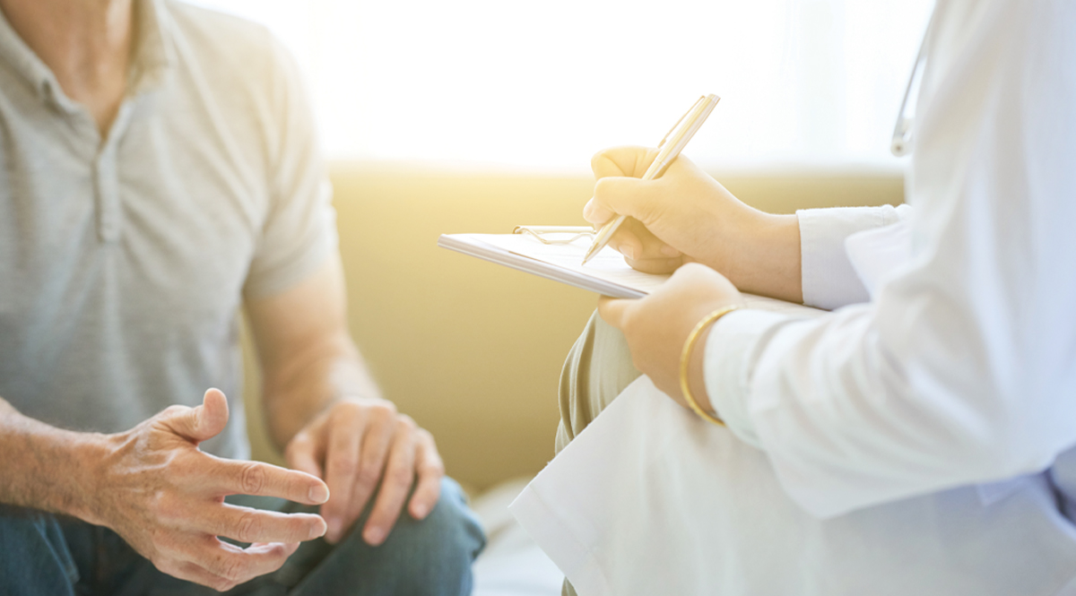 man meeting with a doctor