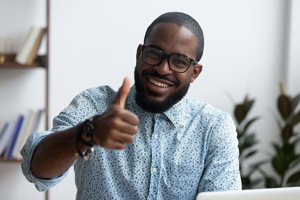 African American man giving a thumbs up