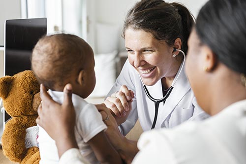 Doctor giving child an checkup