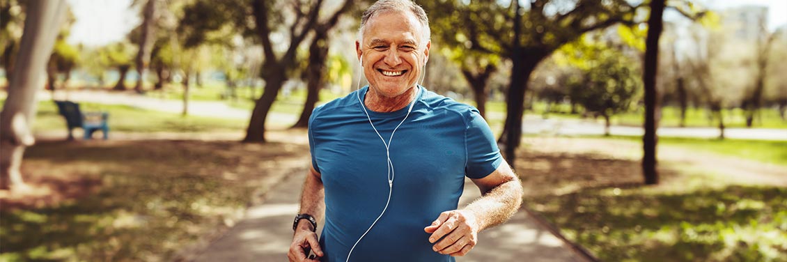 Senior man running outdoors