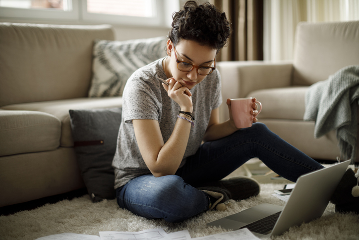 Woman studying in her home