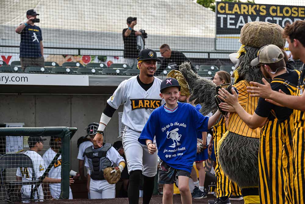 Local teams and fans come together during the BCBSND Caring Foundation’s Strike Out the Stigma campaign to support mental health awareness across North Dakota communities.