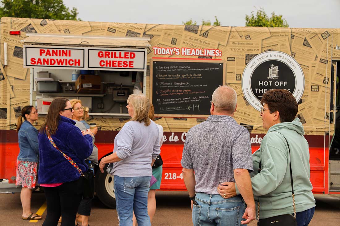 Customers outside a food truck