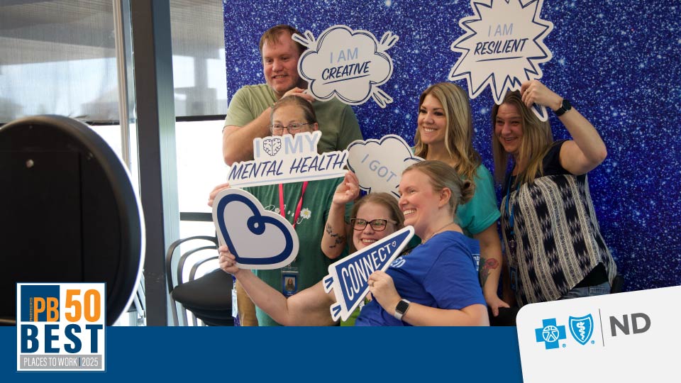 BCBSND Employees taking a selfie for mental health awareness