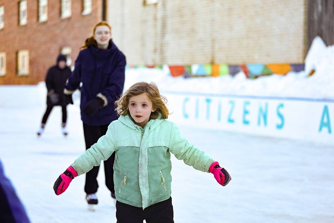Little girl skating at Minot ice rink
