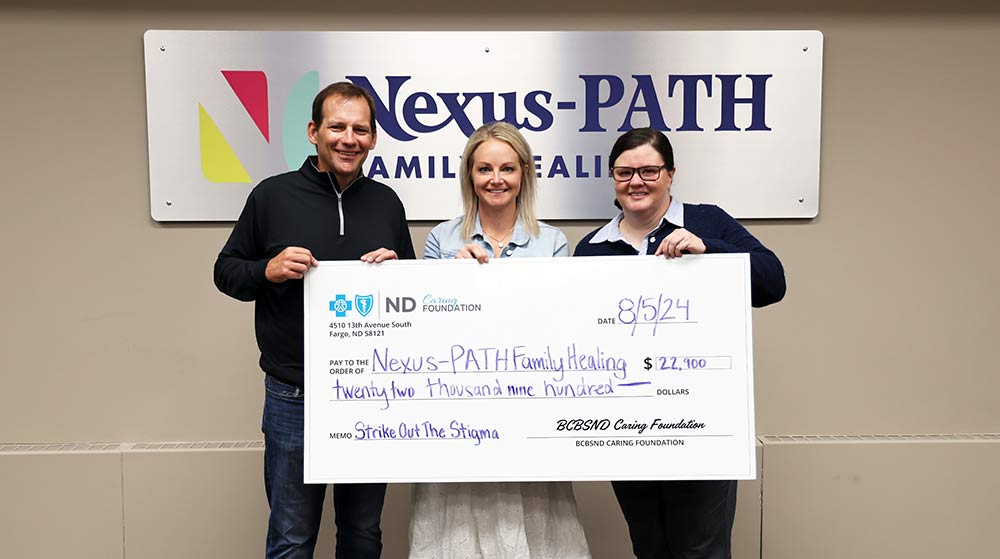 Caring Foundation check presented to Nexus-PATH for Strike Out the Stigma