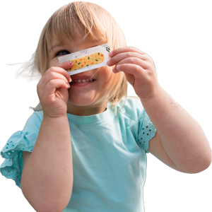 Little girl holding an adhesive bandage in front of her face