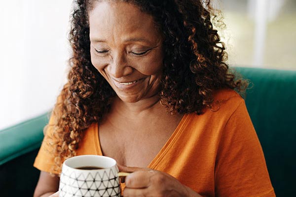 Older woman drinking coffee