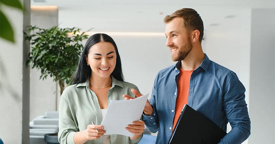 Two coworkers in an office